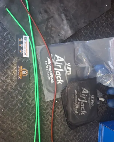 AirJack inflatable wedges and a long-reach tool used to open locked cars